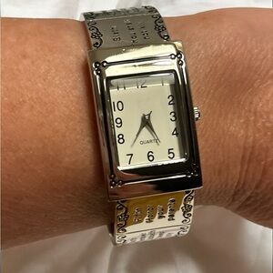 Avon Silver Tone 10 Commandments Cuff Watch